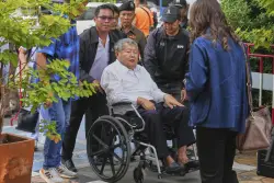 Construction magnate surrenders to police over Bangkok tower collapse in earthquake