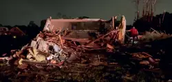 More than 20 dead after tornadoes sweep through Kentucky and Missouri